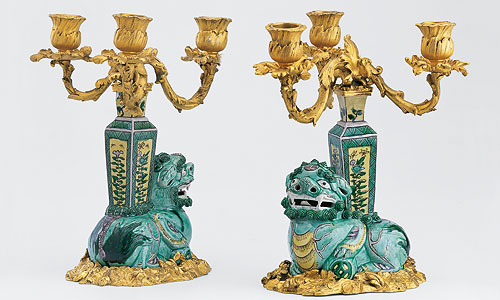 Picture: Pair of Chinese lions with vases on their backs